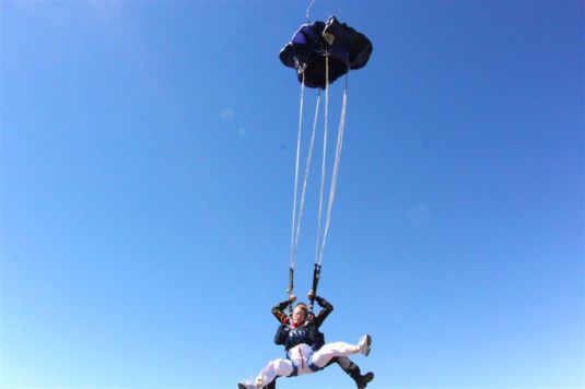 Our parachute opening ~ there really is nothing lady like about skydiving!! 