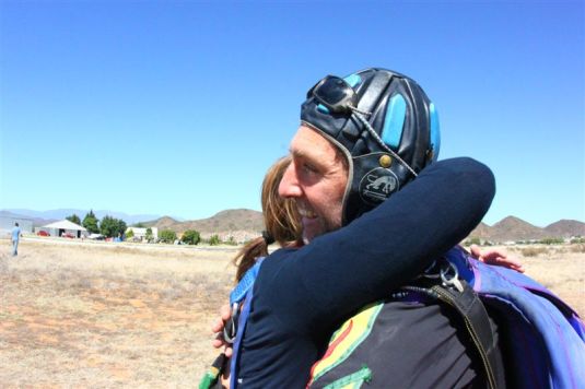 A hug for Timmy, my tandem master, who let me fly and got my safely back to earth and helped me tick off # 46 on my bucket list. Super-Amazing!!