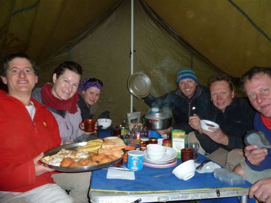 Enjoying our last breakfast together on the mountain after successfully summiting earlier that morning.