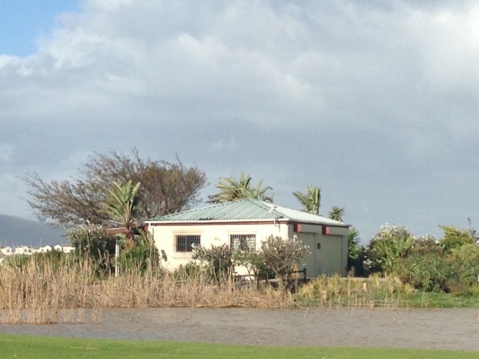 The halfway house on the golf course, still surrounded by water although the levels have dropped considerably.