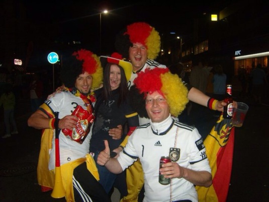 After watching my team play live at the Cape Town Stadium, the celebrating spilled out onto the streets. Here I am celebrating Germany's win with some random Germany fans in 2010.                
