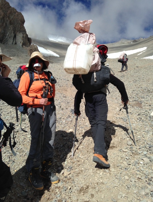 Letting the porters pass us by with their heavy loads. *Photo By Simon Bates*